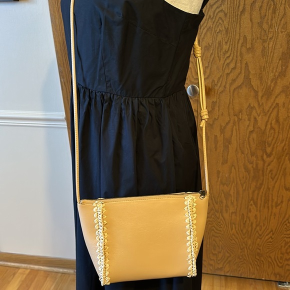 A New Day black dress size medium with a tan Universal Thread cross body purse. - Picture 10 of 16